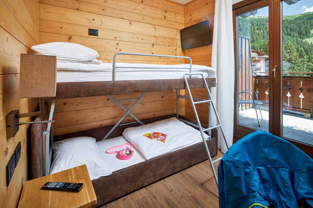 0170 Garni dello Sportivo Camere matrimoniali e familiari letti castello campiglio